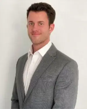 A headshot of Jack Schulz
