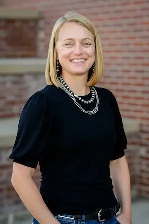 A headshot of Lauren Reiman-Benford, Chief Financial Officer at Legacy Construction Group in Cheyenne, Wyoming